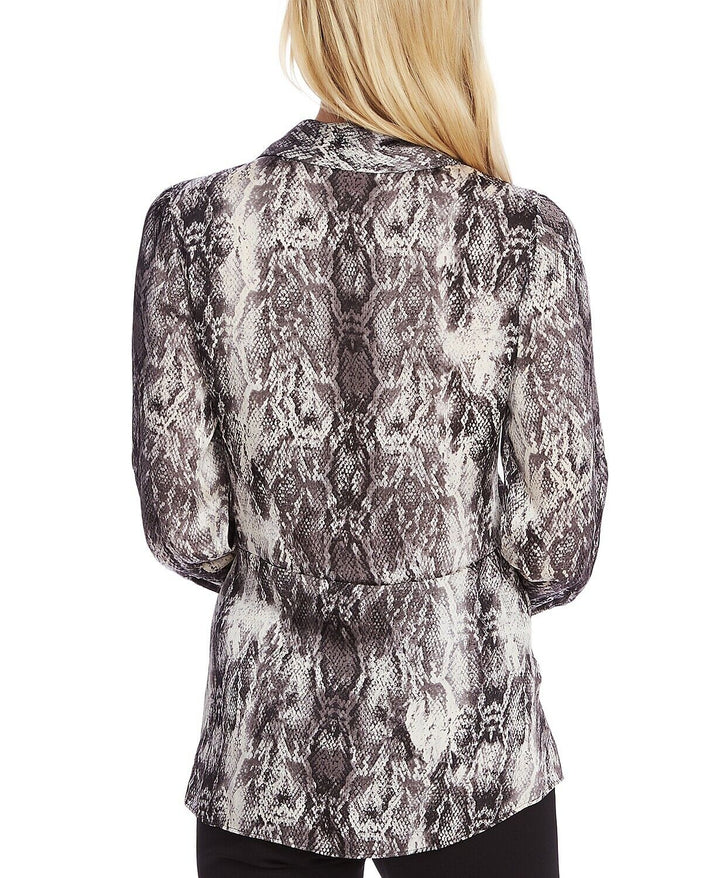 Vince Camuto top peplum torcido con estampado de serpiente